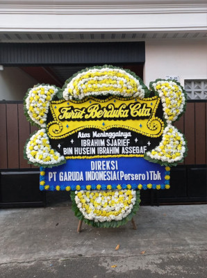 Papan Bunga Duka di Mewoluk